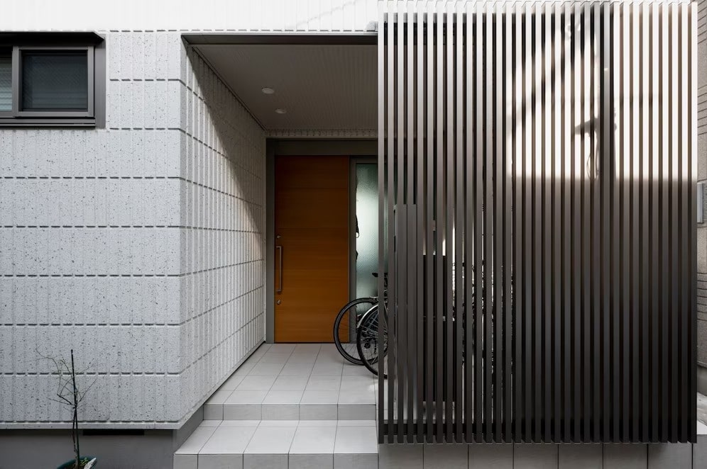 house-entrance-japan-building-with-fence_23-2149301077_11zon-min.jpg