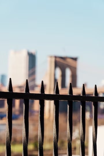 brooklyn-bridge-through-black-fence_23-2148184332_2_11zon-min.jpg